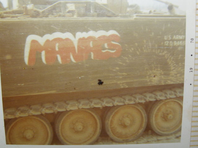 Maniacs-mechanics track after being hit by an RPG in Cambodia